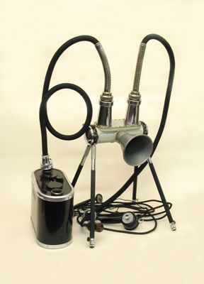Alimentatore e sostegno per tubo a raggi X, portatile